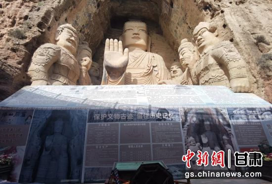 時下，中國“石窟鼻祖”天梯山石窟第13窟大佛足部與局部危巖體搶救性保護項目正在施工。圖為施工現(xiàn)場。陳曉斌 攝